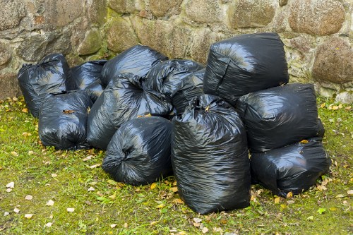 Garden waste being collected by rubbish removal service