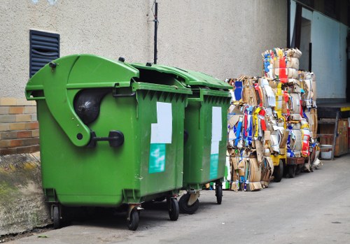 Modern rubbish removal equipment in action